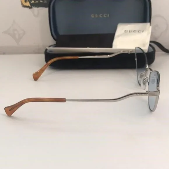 - NEW Gucci GG1006S Cat Eye Sunglasses – Silver / Light Blue 100% AUTHENTIC New Authentic Gucci GG1006S 004 Silver Cat-Eye Sunglasses  main image 2